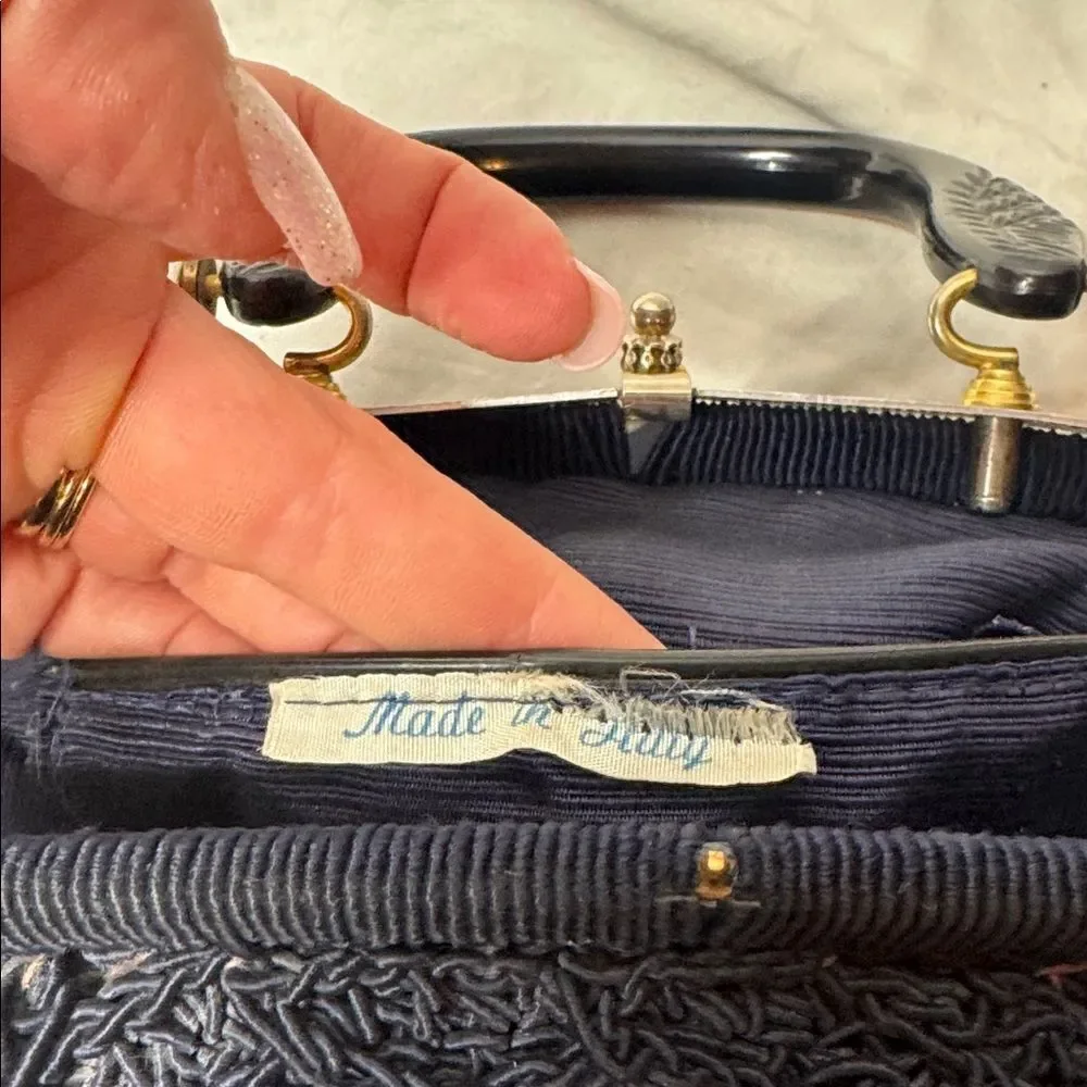 Vintage 60’s Black Knit Dumpling Bag With Silver And Gold Fixtures.